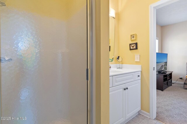 48 Wilmington St, Ocean Isle Beach, NC 28469 - full bath featuring vanity, a stall shower, and tile patterned flooring