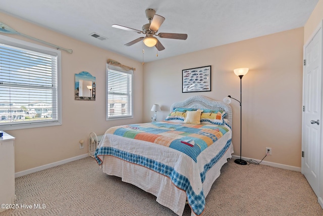 48 Wilmington St, Ocean Isle Beach, NC 28469 - bedroom featuring carpet floors and a ceiling fan