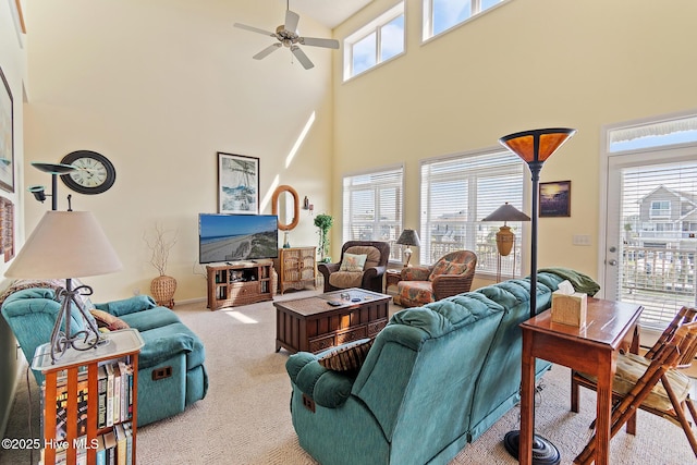 48 Wilmington St, Ocean Isle Beach, NC 28469 - carpeted living area featuring a high ceiling and a ceiling fan