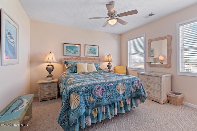 48 Wilmington St, Ocean Isle Beach, NC 28469 - carpeted bedroom featuring baseboards and a ceiling fan