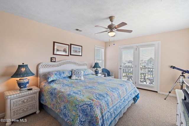 48 Wilmington St, Ocean Isle Beach, NC 28469 - bedroom featuring carpet floors, access to exterior, and a ceiling fan