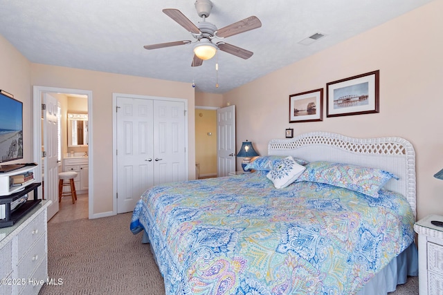 48 Wilmington St, Ocean Isle Beach, NC 28469 - bedroom with light carpet, a closet, and a ceiling fan