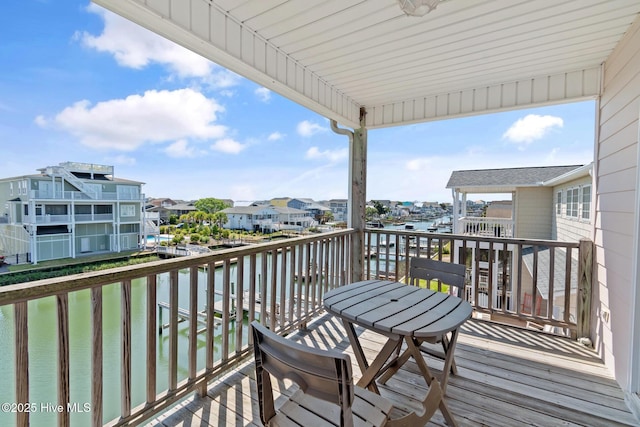 48 Wilmington St, Ocean Isle Beach, NC 28469 - balcony with a water view and a residential view