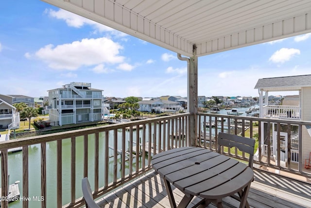 48 Wilmington St, Ocean Isle Beach, NC 28469 - balcony with a water view and a residential view