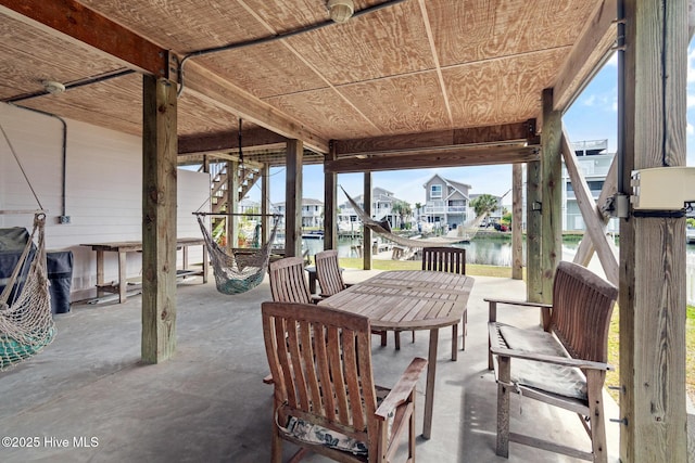 48 Wilmington St, Ocean Isle Beach, NC 28469 - view of patio with a water view