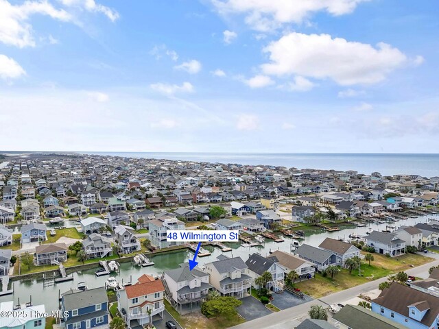 48 Wilmington St, Ocean Isle Beach, NC 28469 - aerial view of residential area with a nearby body of water