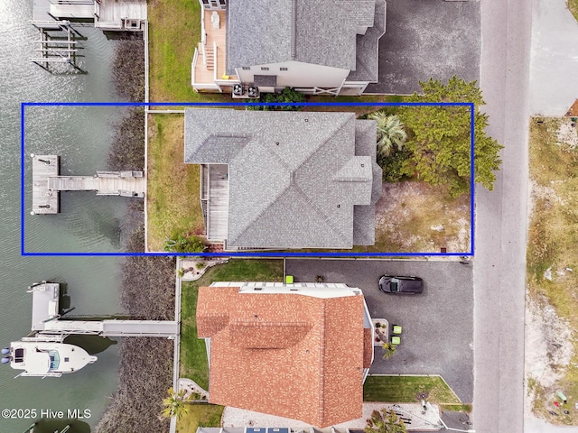 48 Wilmington St, Ocean Isle Beach, NC 28469 - aerial view of property and surrounding area with property boundaries highlighted and a large body of water