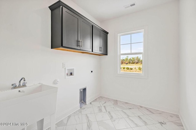 laundry room featuring electric dryer hookup, visible vents, a sink, hookup for a washing machine, and marble finish floor