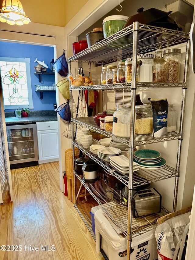 storage featuring wine cooler