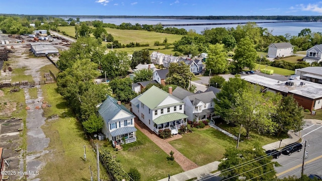 aerial view with a water view and a residential view
