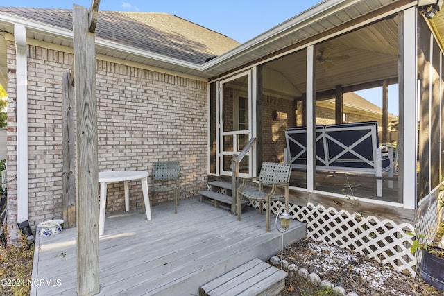 deck featuring a sunroom