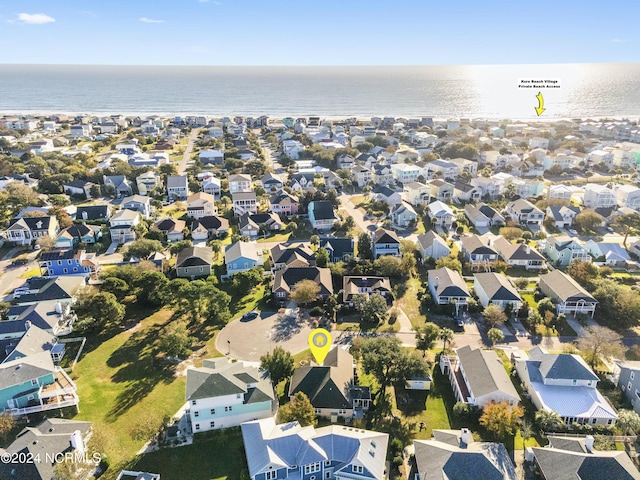 bird's eye view with a residential view and a water view