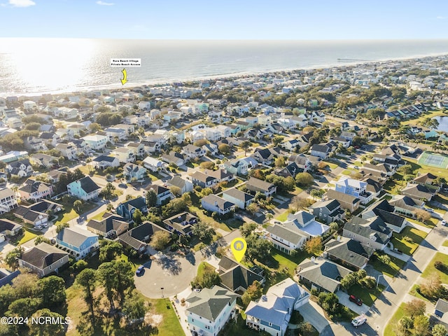 bird's eye view featuring a water view and a residential view