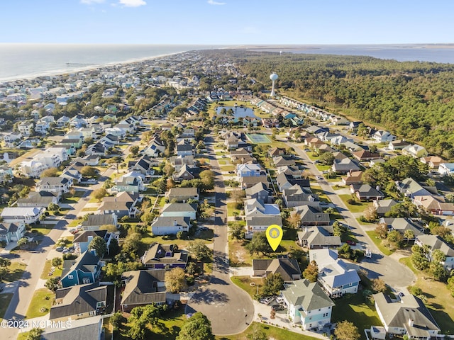bird's eye view with a water view and a residential view