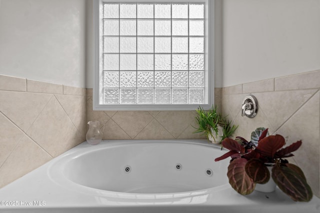 full bathroom featuring a whirlpool tub