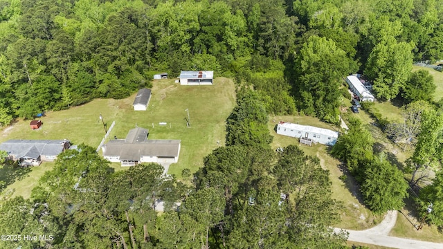 aerial view featuring a view of trees