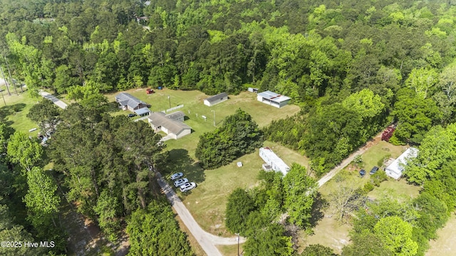 aerial view featuring a view of trees