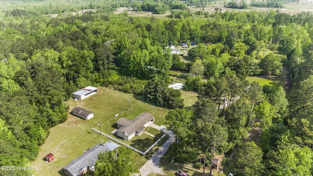 bird's eye view with a forest view