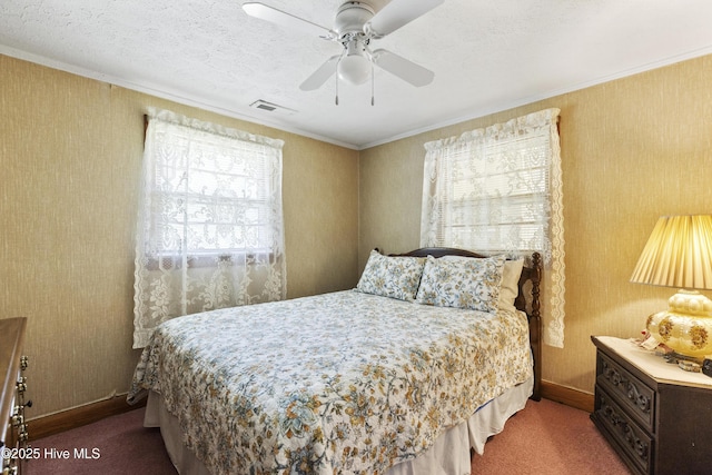 bedroom featuring visible vents, ornamental molding, baseboards, and carpet floors