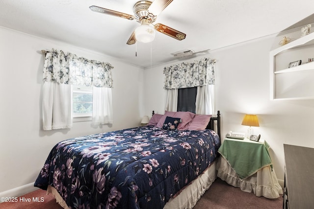 bedroom with baseboards, ornamental molding, carpet flooring, and ceiling fan