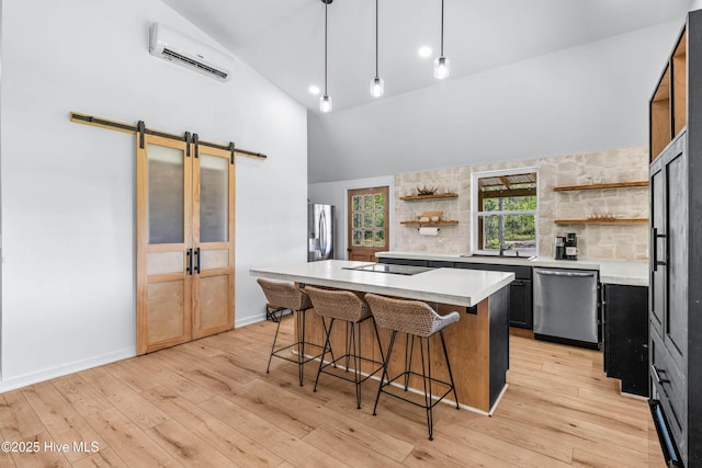 500 Tomahawk Rd, Maple Hill, NC 28454 - kitchen with appliances with stainless steel finishes, open shelves, high vaulted ceiling, a sink, and a wall unit AC