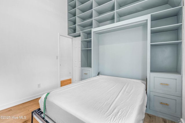 500 Tomahawk Rd, Maple Hill, NC 28454 - bedroom with wood finished floors and baseboards