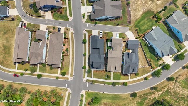 aerial overview of property's location with nearby suburban area