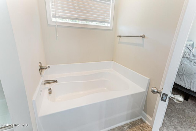 ensuite bathroom with ensuite bath and a bath