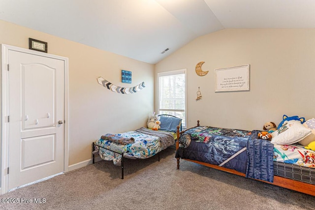 bedroom with baseboards, carpet, vaulted ceiling, and visible vents