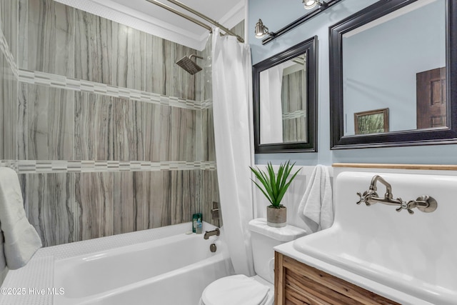 bathroom with toilet, shower / bath combo, and vanity