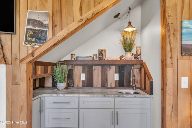 bar featuring a sink and indoor wet bar