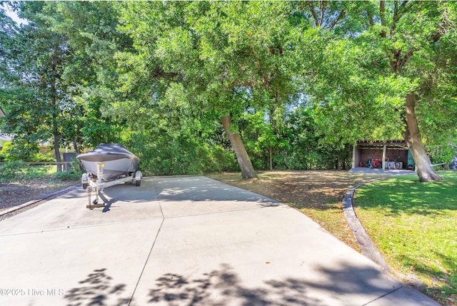 view of patio / terrace with concrete driveway