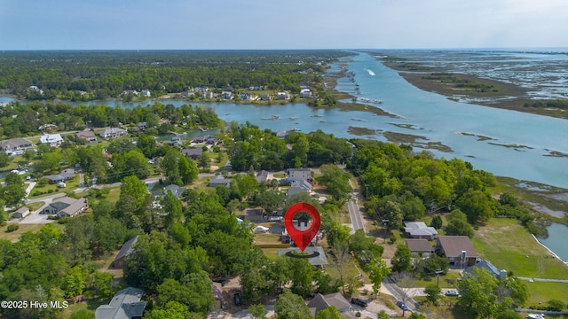 drone / aerial view with a water view and a residential view