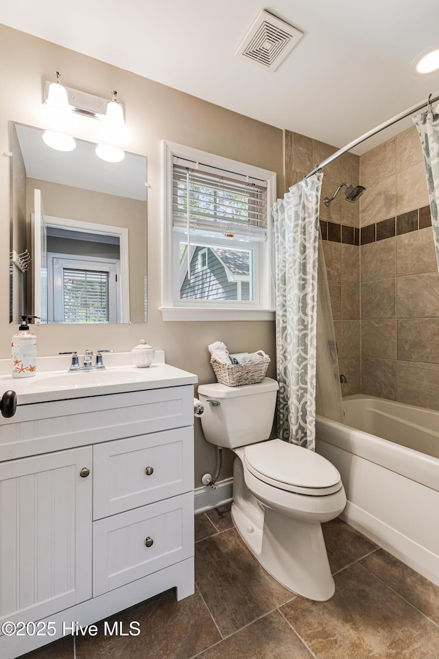 116 SE 20th St, Oak Island, NC 28465 - bathroom featuring toilet, visible vents, shower / bath combination with curtain, and vanity