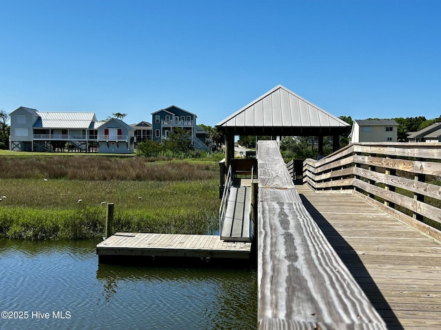 116 SE 20th St, Oak Island, NC 28465 - dock area featuring a gazebo and a water view