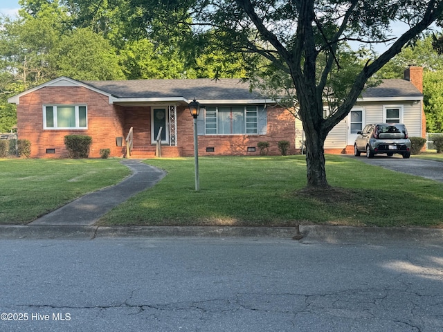 212 S Spence Ave, Goldsboro, NC 27534 - ranch-style house featuring crawl space, a front yard, and a chimney