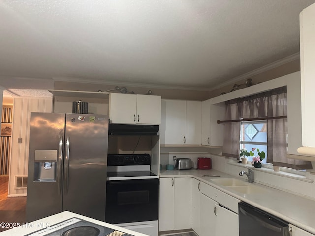 212 S Spence Ave, Goldsboro, NC 27534 - kitchen featuring appliances with stainless steel finishes, ornamental molding, light countertops, under cabinet range hood, and a sink