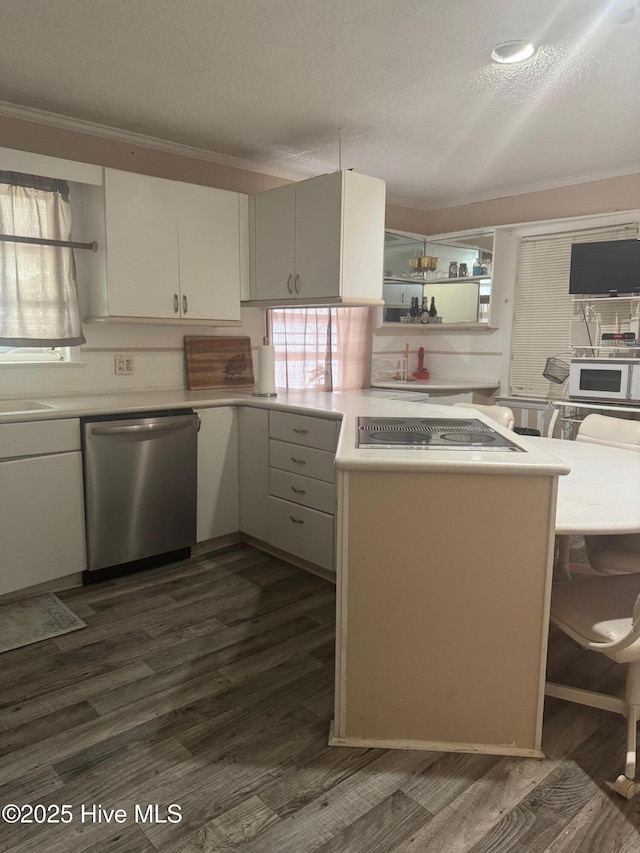 212 S Spence Ave, Goldsboro, NC 27534 - kitchen featuring dishwasher, white microwave, light countertops, dark wood-style flooring, and crown molding