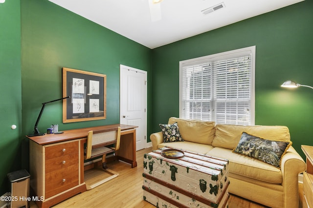 3733 Winstead Cir, Southport, NC 28461 - home office with baseboards, visible vents, and wood finished floors
