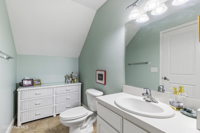 3733 Winstead Cir, Southport, NC 28461 - bathroom featuring vanity, vaulted ceiling, and toilet
