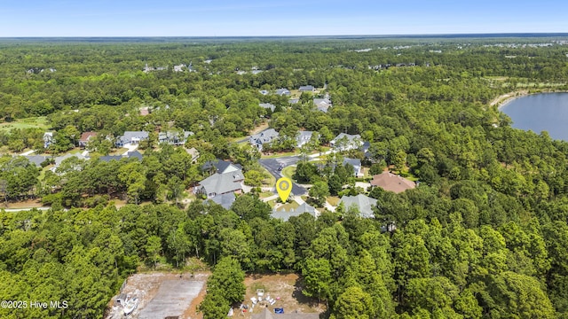 3733 Winstead Cir, Southport, NC 28461 - birds eye view of property featuring a water view and a forest view