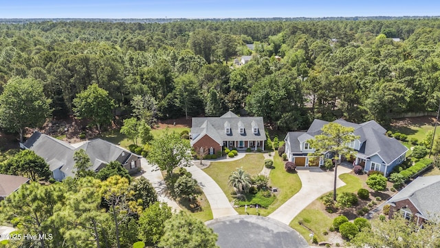 3733 Winstead Cir, Southport, NC 28461 - aerial view featuring a forest view