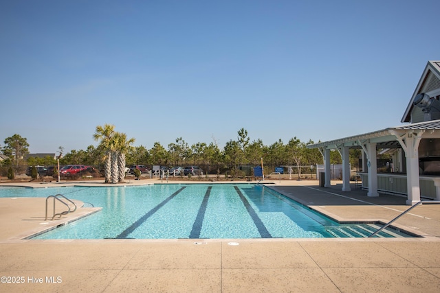 3733 Winstead Cir, Southport, NC 28461 - pool with fence and a patio