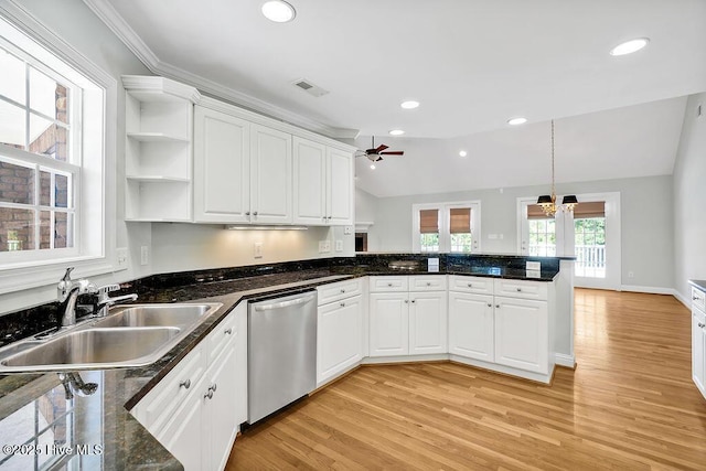 600 Sea Castle Ct, Wilmington, NC 28412 - kitchen featuring a sink, a peninsula, light wood-type flooring, white cabinetry, and stainless steel dishwasher
