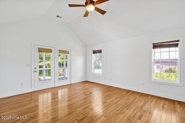 600 Sea Castle Ct, Wilmington, NC 28412 - unfurnished room featuring lofted ceiling, visible vents, light wood finished floors, a ceiling fan, and baseboards