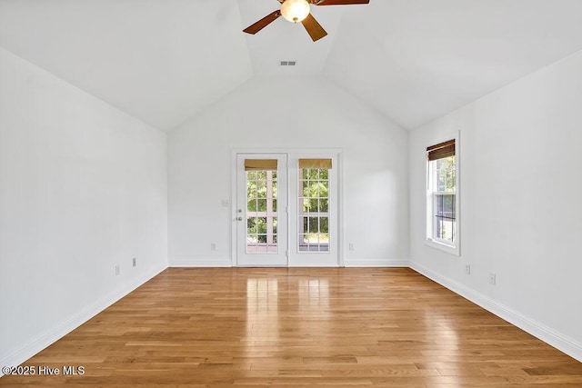 600 Sea Castle Ct, Wilmington, NC 28412 - empty room with visible vents, baseboards, ceiling fan, light wood-style floors, and vaulted ceiling