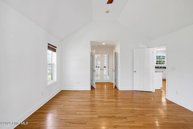 600 Sea Castle Ct, Wilmington, NC 28412 - interior space with lofted ceiling, light wood-style flooring, french doors, and multiple windows