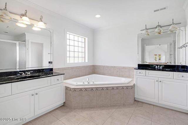 600 Sea Castle Ct, Wilmington, NC 28412 - bathroom featuring a sink, a shower stall, a bath, and visible vents