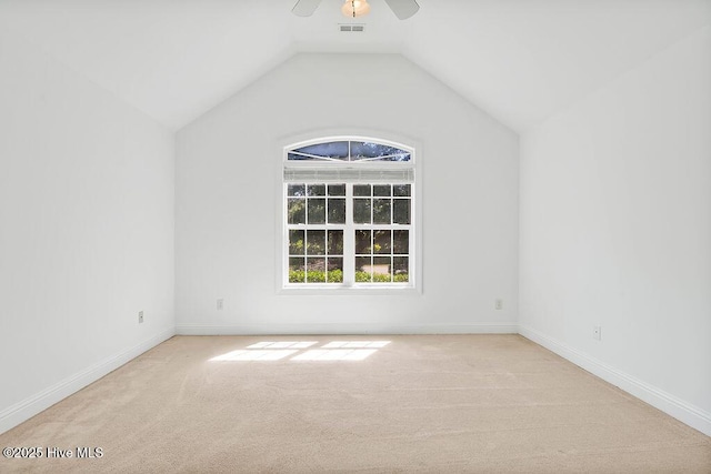 600 Sea Castle Ct, Wilmington, NC 28412 - empty room with a ceiling fan, carpet floors, visible vents, baseboards, and lofted ceiling