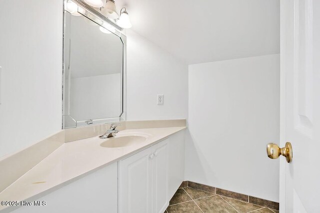 600 Sea Castle Ct, Wilmington, NC 28412 - bathroom featuring baseboards, tile patterned flooring, and vanity